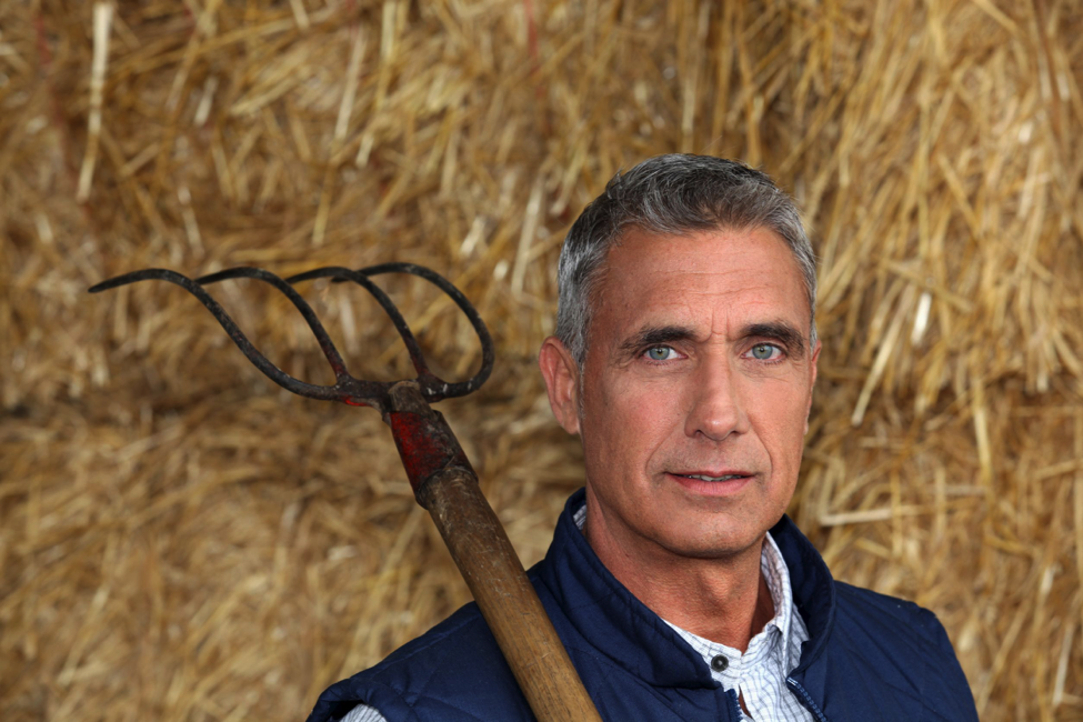 Man Holding Gardening Tool